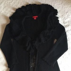 Black long (duster length) sweater....